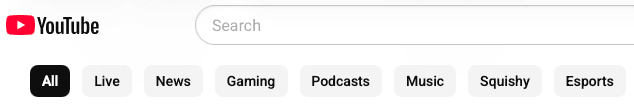 YouTube's top filter pill bar showing the tabs: All, Live, News, Gaming, Podcasts, Music, Squishy, Esports.