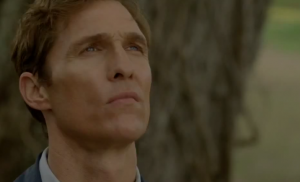 Screenshot of Matthew McConaughey in True Detective observing the opening crime scene